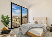 Thumbnail 4 of 27 - A bedroom with a large bed and a view of the city at WM by CLG, Los Angeles, 90232  
