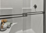 Thumbnail 18 of 33 - a white bathroom with a shower and a sink at The Prairie Villas, Dardenne Prairie, Missouri
