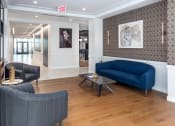 Thumbnail 22 of 32 - a lobby with couches and a coffee table at 2200 LaSalle Apartments, St Louis, MO, 63104