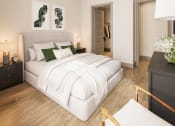 Thumbnail 36 of 58 - a bedroom with a large white bed and a white couch at Bemiston Place Apartments, Clayton, 63105