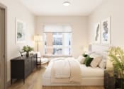 Thumbnail 27 of 58 - a white bedroom with a large bed and a window at Bemiston Place Apartments, Clayton, MO 63105