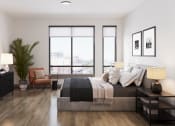 Thumbnail 33 of 58 - a bedroom with a large bed and a large window at Bemiston Place Apartments, Missouri, 63105