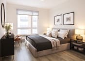 Thumbnail 47 of 58 - a bedroom with a large bed and a window at Bemiston Place Apartments, Missouri, 63105