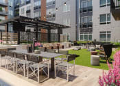 Thumbnail 3 of 58 - a rendering of an outdoor patio area with tables and chairs at Bemiston Place Apartments, Clayton, MO