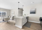 Thumbnail 19 of 28 - Open kitchen and living room at The Junction at Rogers, AR, 72756