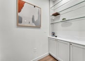 Thumbnail 35 of 37 - White cabinet at Plaza at Pinnacle Hills, Rogers, 72758