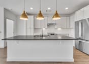 Thumbnail 31 of 37 - Kitchen with island at Plaza at Pinnacle Hills, Arkansas, 72758