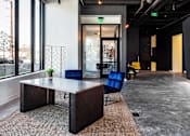 Thumbnail 11 of 39 - lobby with desk and seating at Steelcote Square, Missouri