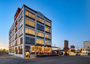 Thumbnail 33 of 39 - Steelcote Lofts exterior, historic building at dusk at Steelcote Square, St. Louis, Missouri