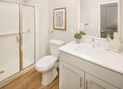 Thumbnail 10 of 19 - a bathroom with a toilet sink and shower at 44 West Luxury Living, Valley Park