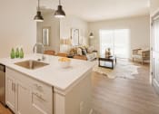 Thumbnail 2 of 19 - an open floor plan with a kitchen and living room at 44 West Luxury Living, Valley Park, MO