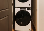 Thumbnail 13 of 19 - Full-size stackable washer and dryer in unit at 44 West Luxury Living, Valley Park, MO