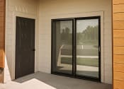 Thumbnail 14 of 19 - Patio with sliding glass door and extra storage at 44 West Luxury Living, Valley Park, MO, 63088