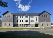 Thumbnail 15 of 18 - Apartment Building Exterior at Pure Lowell, Lowell Arkansas
