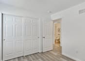 Thumbnail 15 of 33 - A white door with a white wall behind it.