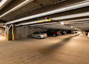 Thumbnail 36 of 36 - A parking garage with a sign at The Cunningham Apartments, Iowa, 50266