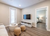 Thumbnail 24 of 66 - Living Area With TV at Preserve at Sycamore Creek, Osage Beach, MO 65065