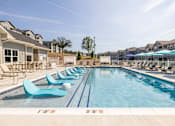 Thumbnail 38 of 66 - Pool With Relaxing Chairs at Preserve at Sycamore Creek, Osage Beach, MO 65065