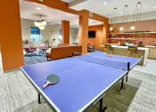 Thumbnail 10 of 17 - clubroom/resident lounge with ping pong table at The Residences at Delmar DivINe, St Louis, MO