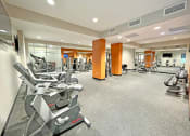 Thumbnail 14 of 17 - large fitness center with exercise equipment at The Residences at Delmar DivINe, St Louis, MO, 63112