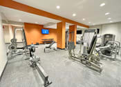 Thumbnail 13 of 17 - large fitness center with exercise equipment at The Residences at Delmar DivINe, St Louis, MO, 63112
