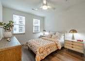 Thumbnail 14 of 60 - Bedroom with Bed and Nightstand at Timber Club, St. Peters, MO, 63304