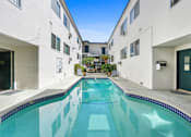 Thumbnail 3 of 13 - A swimming pool in a residential building.