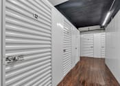 Thumbnail 35 of 39 - A storage unit with the number 32 on the door.