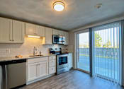 Thumbnail 4 of 25 - Kitchen + Patio