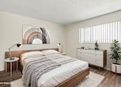 Thumbnail 4 of 19 - A bedroom with a large window