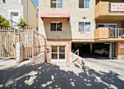 Thumbnail 4 of 6 - A building with the number 2911 on it.