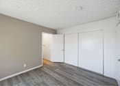 Thumbnail 9 of 15 - A room with a grey floor and white walls.