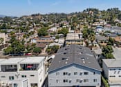 Thumbnail 1 of 10 - A residential area with houses and buildings.