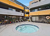 Thumbnail 7 of 19 - A hot tub for residents to enjoy.