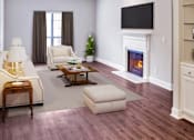 Thumbnail 2 of 12 - Living Room at Lenox Village Apartments, Atlanta, GA