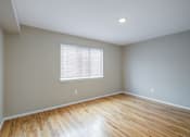 Thumbnail 11 of 13 - A room with a window and wooden flooring at Seaview Apartments in Staten Island, NY, 10305