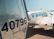 Thumbnail 4 of 20 - an airplane parked on the tarmac at an airport  at Antelope Ridge, Box Elder, SD, 57719