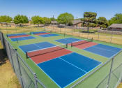 Thumbnail 10 of 31 - tennis court at the village  at The Village at Cottonwood Springs, Texas