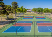 Thumbnail 16 of 31 - tennis courts at the springs at landings apartments  at The Village at Cottonwood Springs, El Paso, 79934