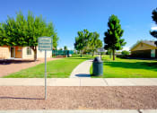 Thumbnail 17 of 31 - a sidewalk leading to the apartments at The Village at Cottonwood
