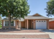 Thumbnail 21 of 31 - Exterior view of a house with private garage at The Village at Cottonwood Springs in El Paso, Texas
