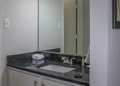 Thumbnail 31 of 31 - a bathroom with a sink and a mirror at The Village at Cottonwood Springs, El Paso, 79934