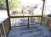 Thumbnail 14 of 14 - the deck has a view of the street and the house