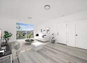 Thumbnail 7 of 27 - A modern living room with a glass table and white furniture.