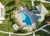 Thumbnail 15 of 37 - An aerial view of a house with a swimming pool.