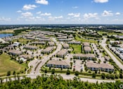 Thumbnail 22 of 35 - A bird's eye view of a residential area with houses and roads.