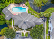 Thumbnail 2 of 48 - A large house with a pool in the backyard.