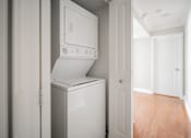 Thumbnail 80 of 86 - A white oven and dishwasher in a kitchen.