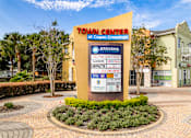 Thumbnail 42 of 50 - A sign for the Town Center at Cagan Crossings with a phone number and a list of businesses.
