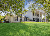 Thumbnail 9 of 15 - Clubhouse exterior at Southfork MHC in Belton, MO